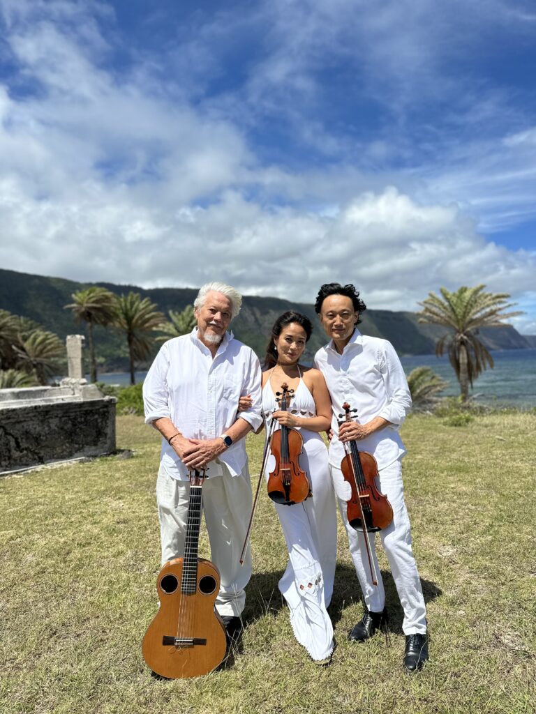 Keola Beamer with Chee-Yun and Ignace Jang standing with their instruments